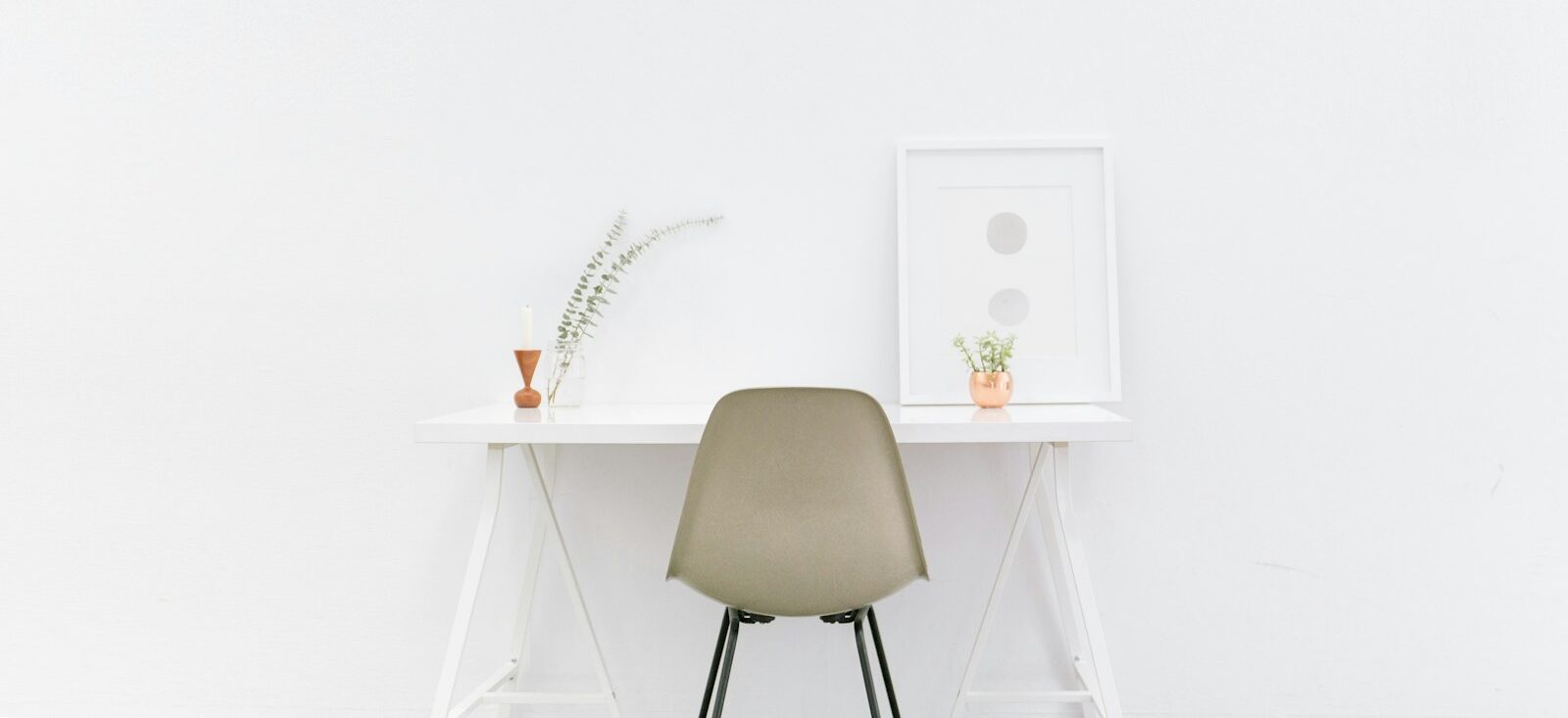 white wooden table near brown chair